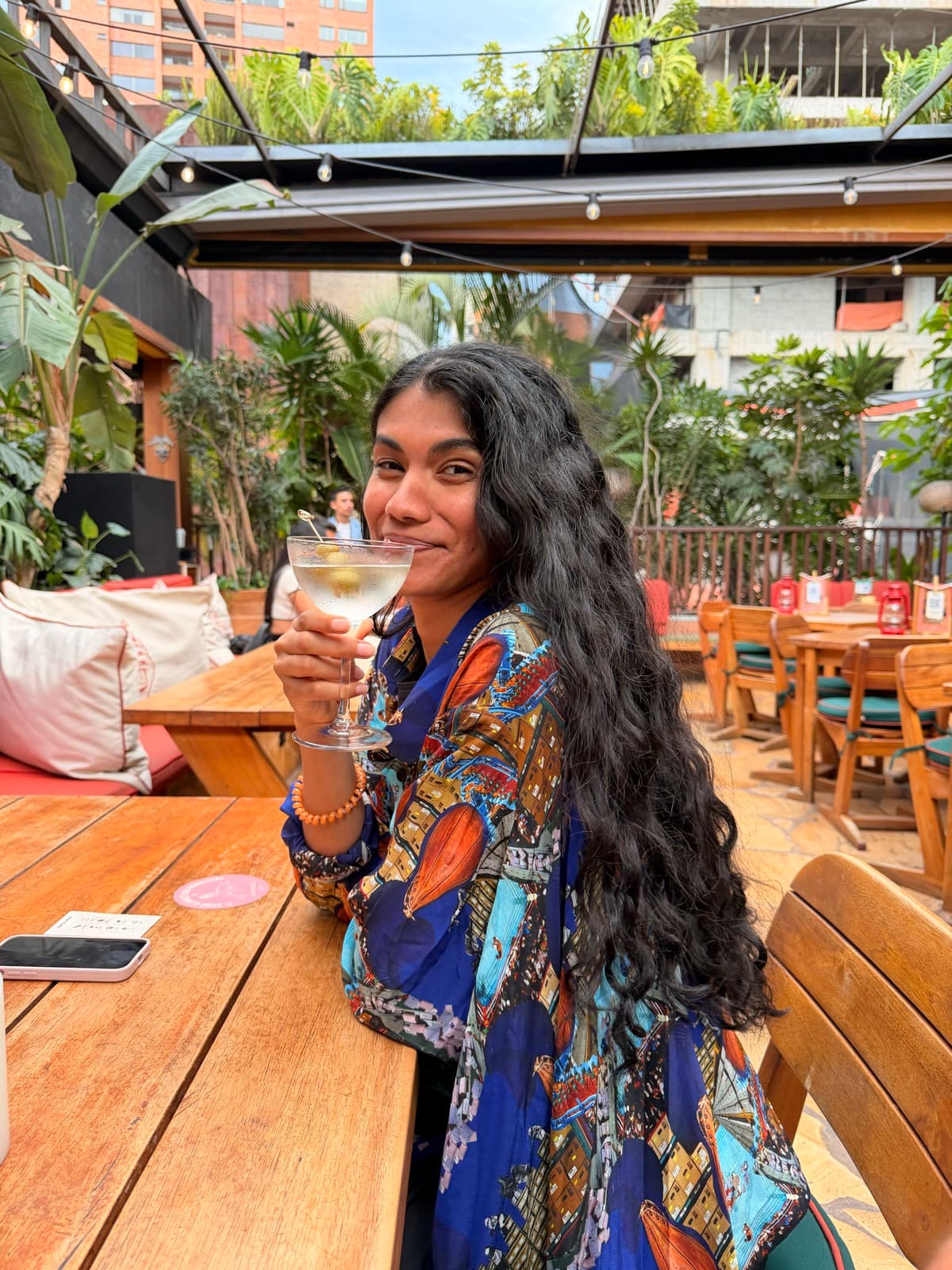 Someone taking a break with a drink in hand.